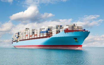 Large container carrier is at sea. Large container carrier is at sea.